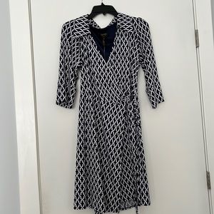 Laundry by Shelli Segal. Navy and white patterned wrap dress